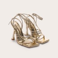 ec264c6f43a1380bd22ec81b207e6e0d04693311_CNM0645_2_gold_pu_square_toe_asymmetric_strappy_lace_up_high_heel_sandals