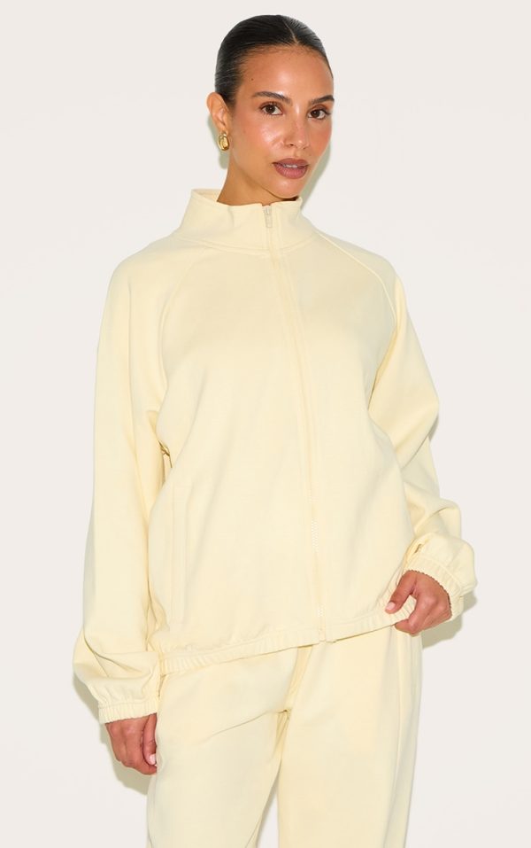 ec472bab6713765f80a20d343155f556e6077cee_CNM7244_1_petite_butter_cream_oversized_interlock_zip_through_sweatshirt