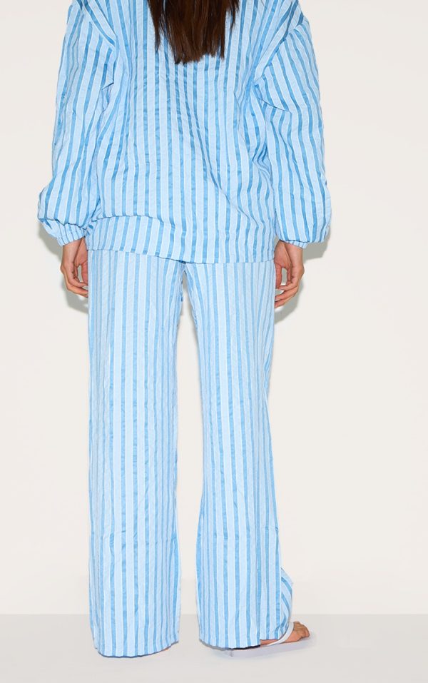 ecd1c3d5839eba3b01bcf01f681b8cdfee15dd22_CNM1732_3_blue_striped_textured_tie_drawstring_wide_leg_trousers