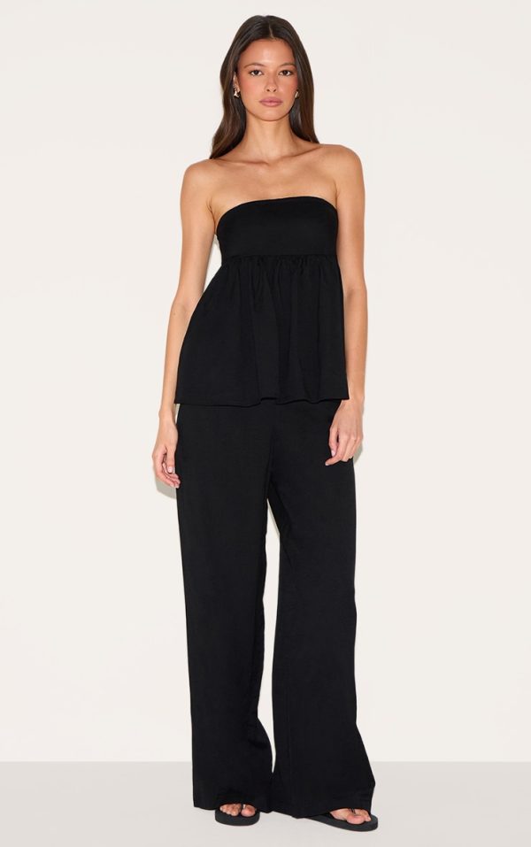 ed17c683a8295b22be0be4cd178a79bb9871fe32_CNM0436_1_black_bandeau_peplum_detail_jumpsuit-1