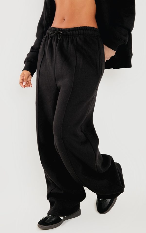 eda3bf86dbc757a308ec7734aa39f1774eb201c4_CNK4388_2_petite_black_seam_detail_straight_leg_joggers