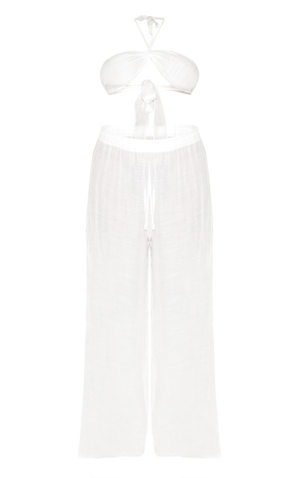 ee54316ec1ff736e2f01cea37a8334878456177e_CNM3059_5_plus_white_trousers_and_top_set