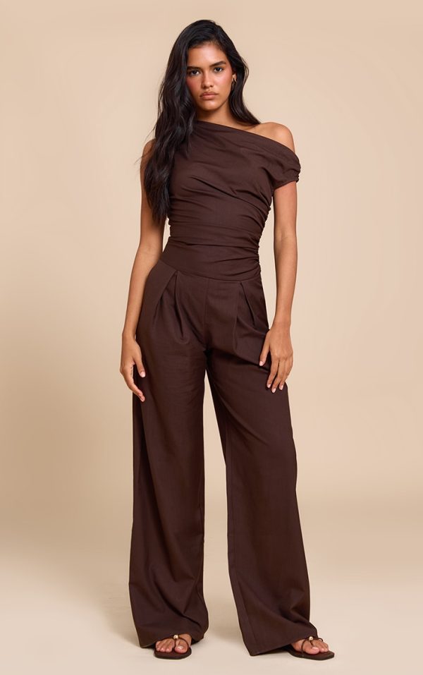 ef1c615df7f42449a14abe23fc9985779bf8a731_CNM0442_1_chocolate_woven_ruched_one_sleeve_jumpsuit