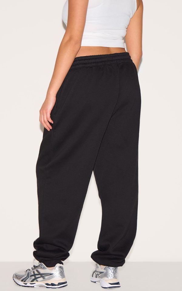 ef29e5ca2b8277d8c206bc721baa8b5c52b85cb7_CNL9475_3_prettylittlething_plus_deep_black_high_waisted_cuffed_joggers