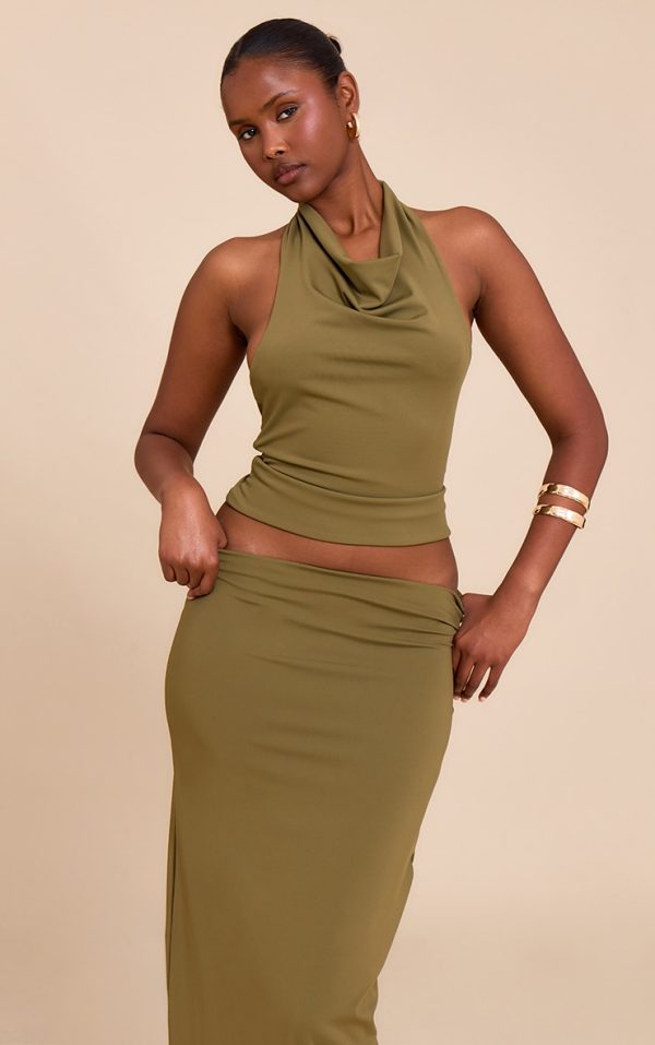 ef38b83e449f627341e88a527d7e1953f7cd0335_CNN0907_1_olive_matte_sculpt_halterneck_gold_detail_backless_top