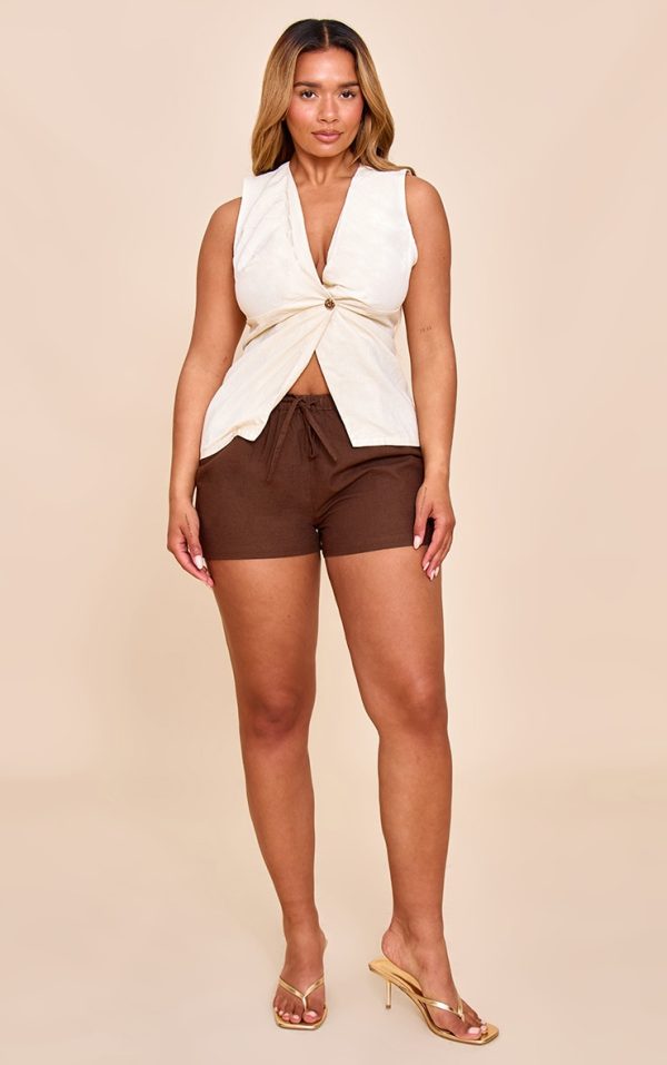 ef47be9a87b98861f95a93586f361d05c5eaed1a_CNM6304_3_shape_cream_linen_plunge_front_ruched_gold_hammered_button_waistcoat