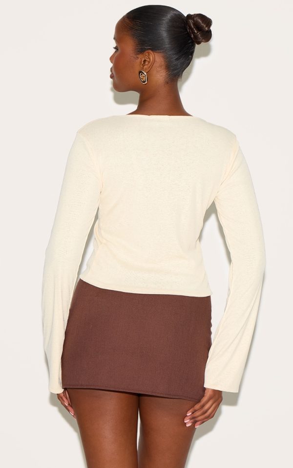f0fcd6a0456666caefff9b0337a1c59c1473b7bf_CNM7976_2_almond_onion_skin_boatneck_flute_sleeve_long_top