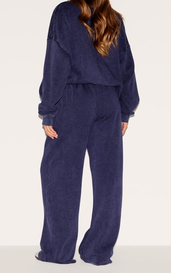f1a44d15bd328cd9d51a4b7f1db69cd426150fa2_CNM4687_3_navy_saint_louis_embroidered_wide_leg_joggers