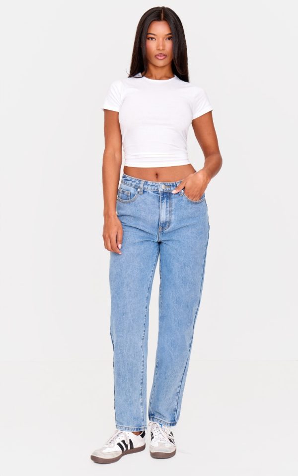 f52e717c189512565d492cd25a69eb956f303190_CNL6140_1_prettylittlething_mid_blue_wash_high_waist_mom_jeans