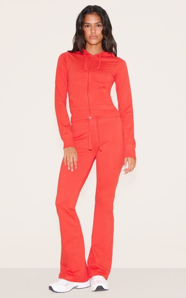 f60dfac7ff342c0e3e00307dfc1d956fe1083345_CNN0640_3_deep_red_zip_up_fitted_track_top