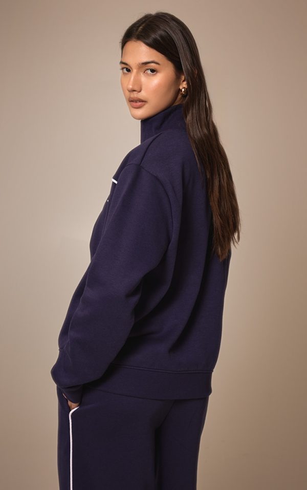 f65c0337fd674e16ac1cb4fa55dcb5571c6d94f5_CNM4825_2_prettylittlething_dark_blue_contrast_piping_detail_zip_through_track_top