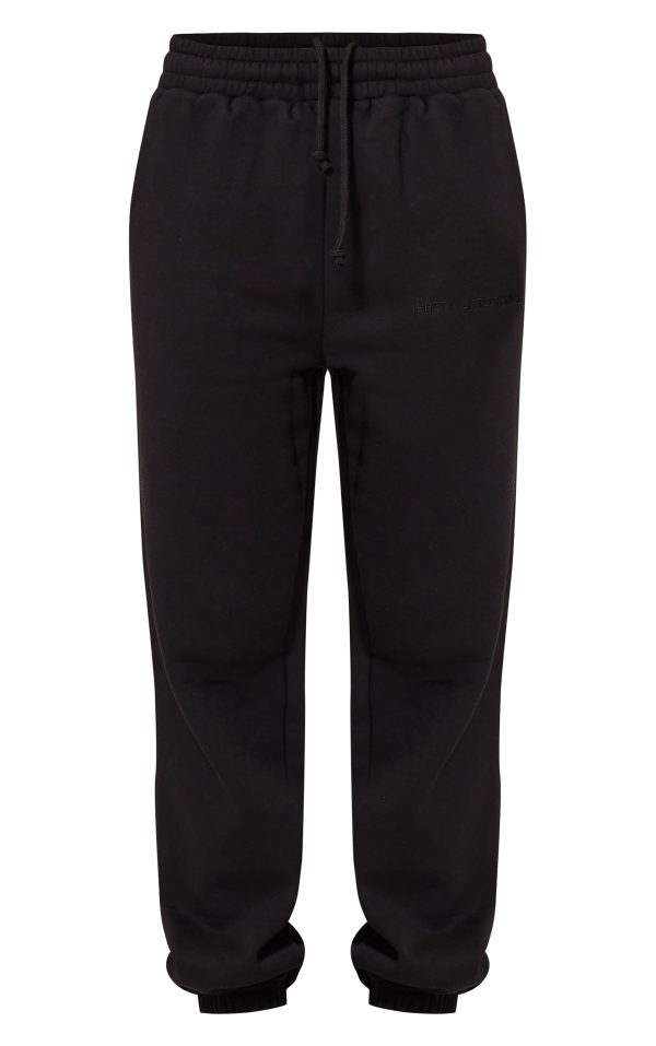 f672ed348b506aa4201e31da917c3c0a5283dfe7_CNK6318_5_prettylittlething_black_oversized_embroidered_cuffed_joggers