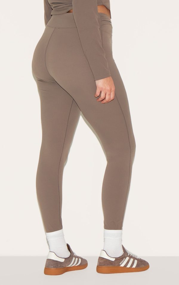 f68b5d0443dd7327948ab55d9bc3850ebeffa003_CNL5090_7_brown_sculpt_twist_front_gym_leggings-1