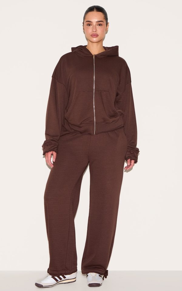f70c9e52301dfd5b9aeb4bec35868afe4045b320_CNM1975_3_shape_chocolate_zip_through_hoodie