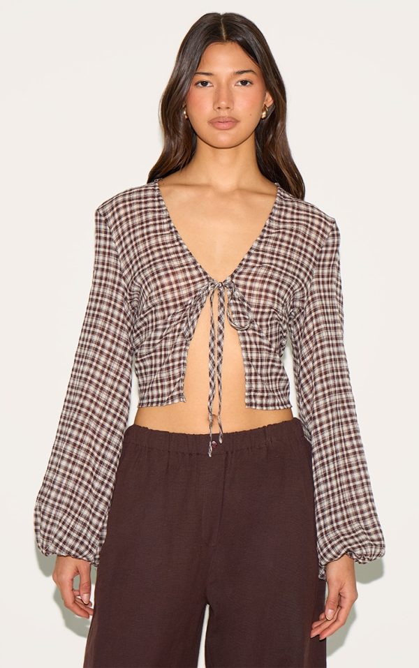 f94c3dd296f3c1da5e127561ee7c0ec947930430_CNM4044_1_brown_tie_front_gingham_blouse