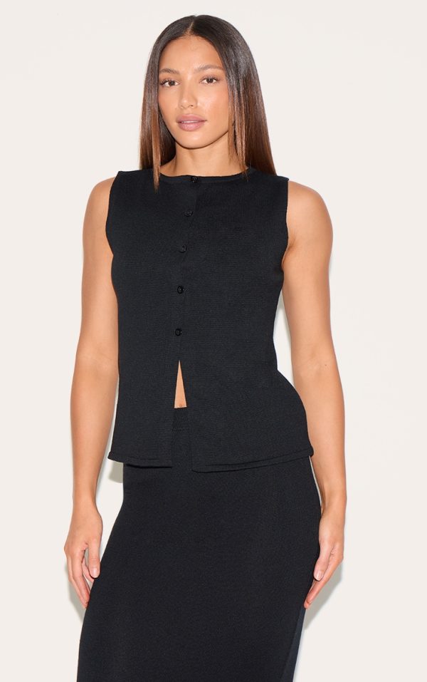 fb0e8d7028dfeb65c959cee29b3905fd8ae054bf_CNM4850_1_tall_black_sleeveless_button_up_knitted_vest