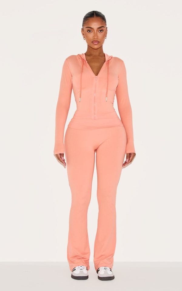 fb2e3a511202b44dfbb9b975bedc88334694a902_CNM1099_1_shape_peach_sculpted_foldover_waist_flare_trousers