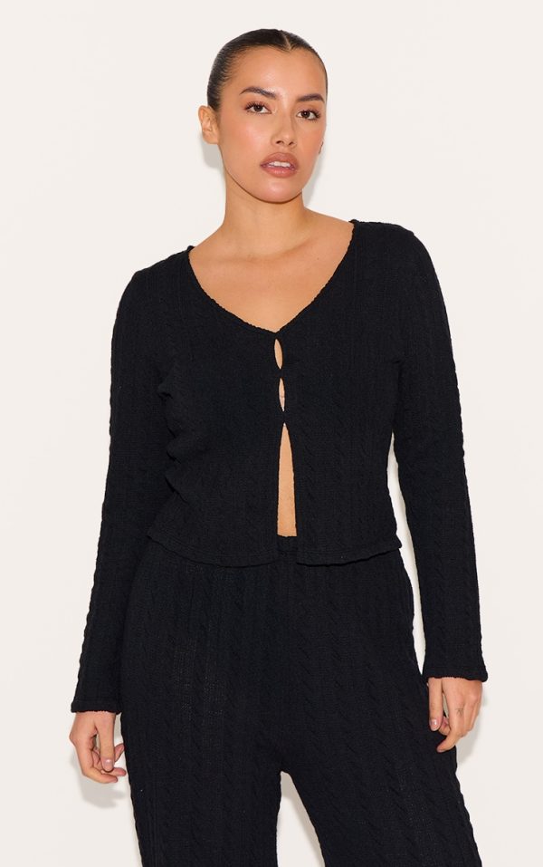 fb60026d86602d9562c5f5869e5d268331790470_CNM0956_1_plus_black_textured_long_sleeve_top
