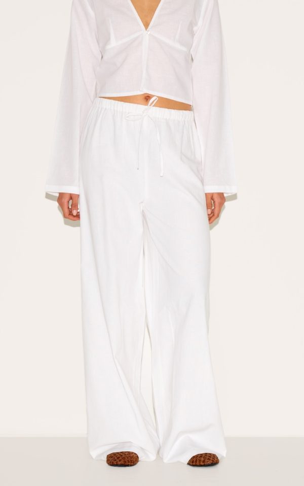 fbddbc1232a24677c2239abc83bb6e9996a095f2_CNM6109_2_white_wide_leg_drawstring_trousers