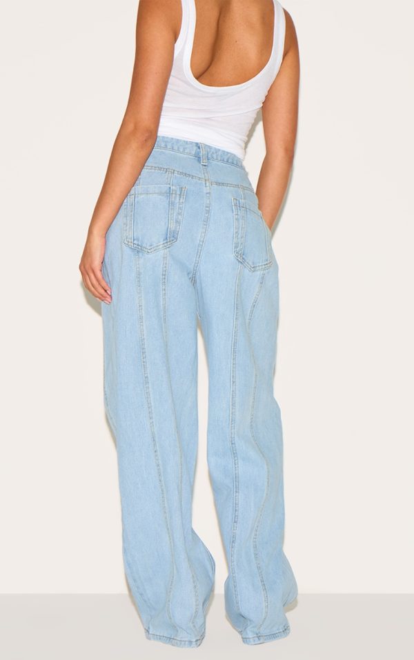 fc16083814a6045ec34cf96f4b75e252a14497e3_CNM2759_3_petite_light_blue_denim_seam_detail_jeans_with_adjustable_straps