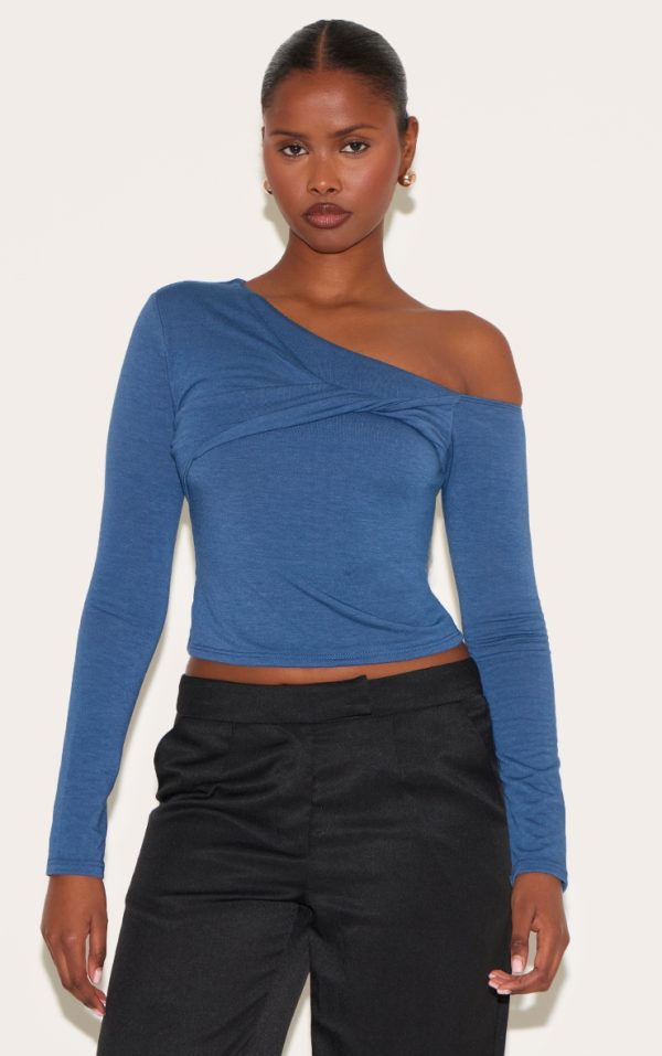 fc18c4109931f32693bb9c8d60a97009c3e2481d_CNM2373_1_petrol_blue_contour_jersey_asymmetric_twist_detail_long_sleeve_top