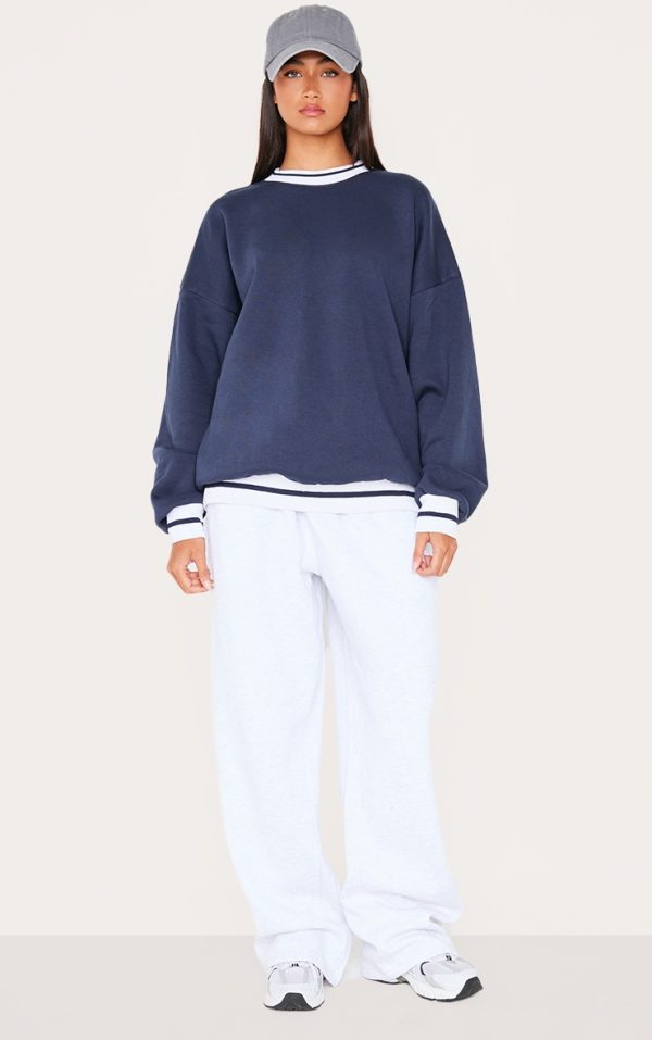 fc24e1b9467ea139cbcd64fe3a7461b48f1425fe_CNL4112_3_navy_striped_ribbed_hem_oversized_sweatshirt