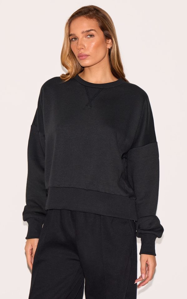fcacdf220bb81c2441be72ede183da5dc815e720_CNM0182_1_black_boxy_basic_sweatshirt