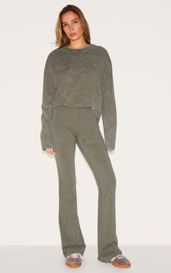 fd582006ad642797667969dfb8be441559b51355_CNM0250_1_prettylittlething_olive_embossed_logo_washed_skinny_flare_trouser