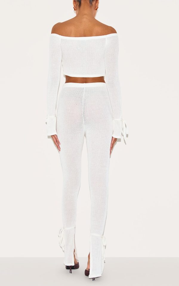 fd65b52539e4f41c2be5e56d4b0d2a445bafd4e9_CNK4890_3_cream_sheer_soft_rib_split_hem_tie_detail_leggings