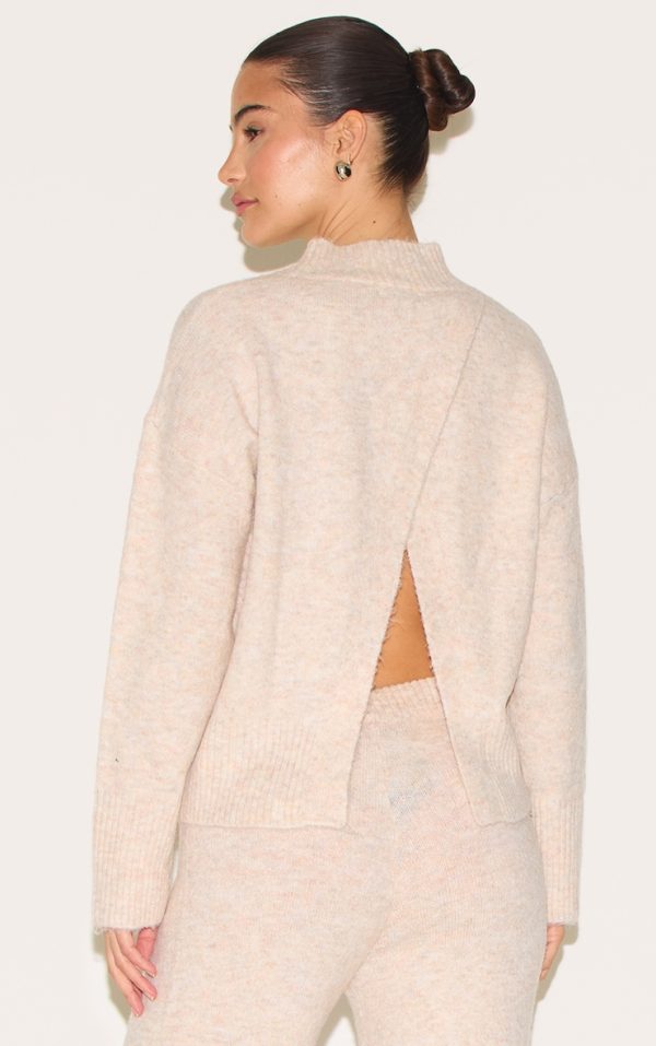 fdf1cba2999331735743a3c3b6aac43889866622_CNG7663_1_stone_luxe_knit_high_neck_open_back_jumper