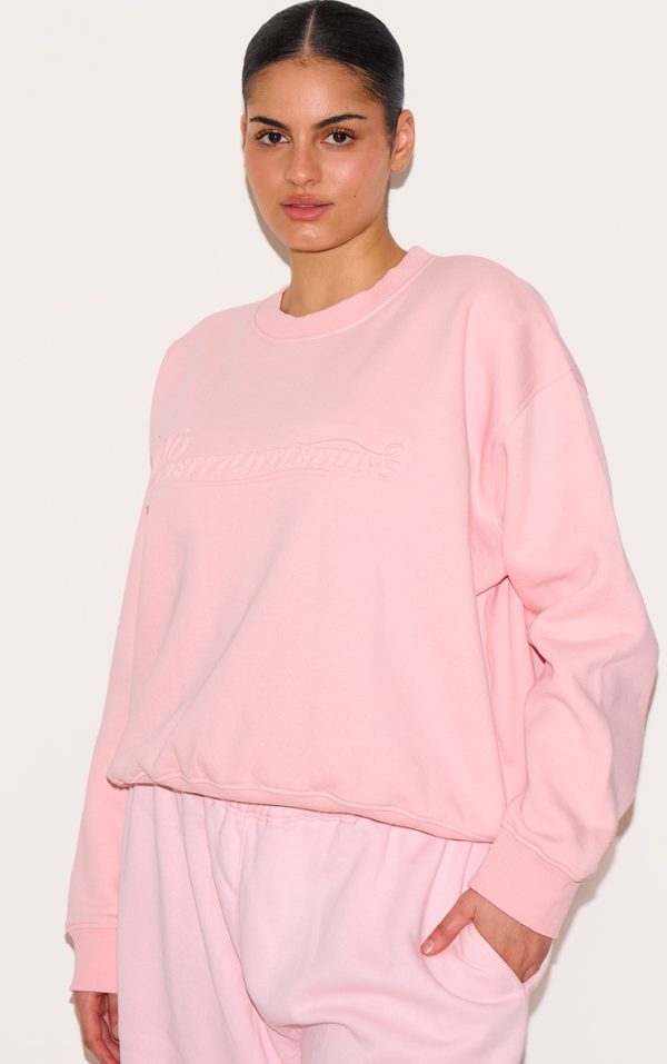 fe8689f448a315629bcd131b56c629d555afdd5d_CNK3401_4_plus_baby_pink_embossed_graphic_oversized_sweatshirt