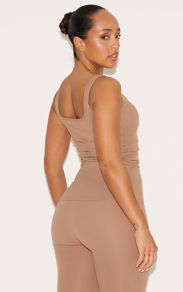 fec9e28af51e4c65419070b43621e7414e9bc787_CNM0970_2_shape_taupe_active_ruched_side_cupped_long_line_top