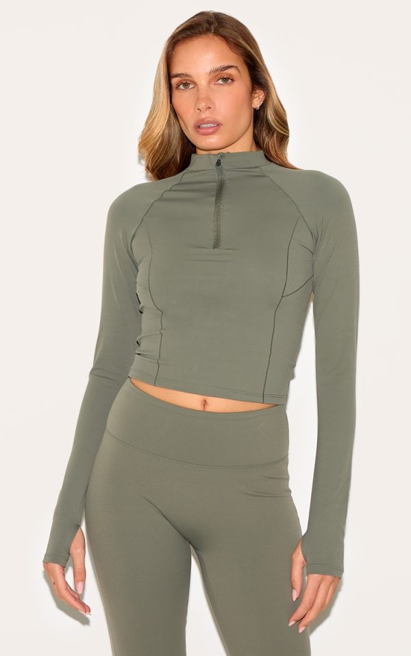 ffd60aaf645607e49c7153170c8456c10d0796b9_CNL6478_1_olive_sculpt_quarter_zip_gym_top-1